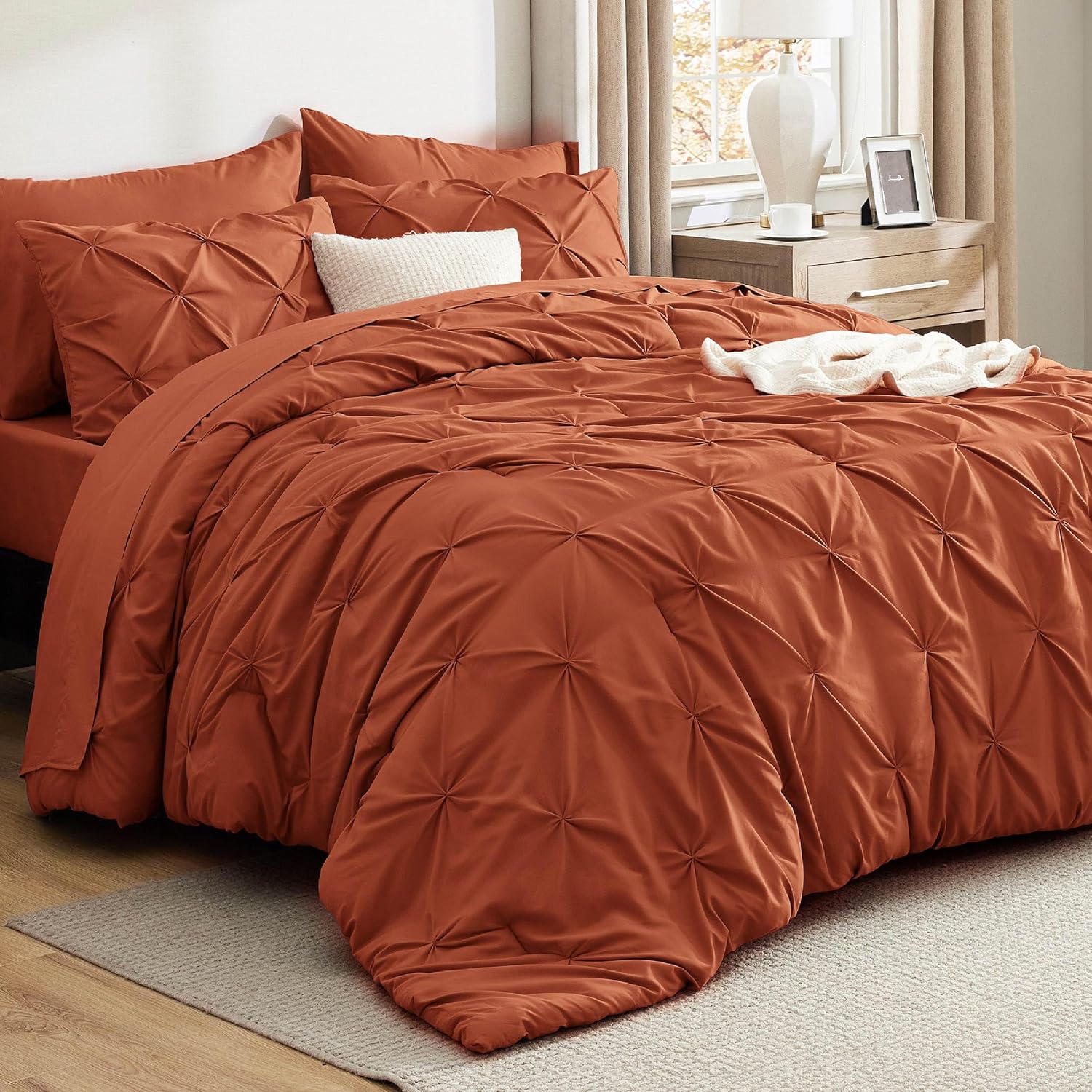 Bedsure Queen Comforter Set Burnt Orange – Bed in a Bag Queen Size Bedding 7 Pieces, GentleSoft™ Pintuck Bed Set Gift for Family, Pinch Pleat Burnt Orange Comforter with Sheets, Pillowcases & Shams
