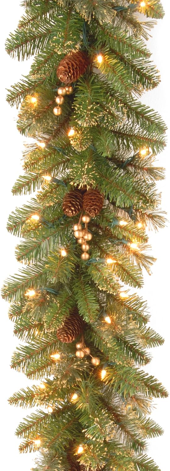 National Tree Company 9 ft Pre-Lit Glittery Gold Pine Artificial Christmas Garland, Christmas Decoration with Pinecones, Berries, 100 Clear Lights, 200 Tips, Green